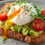 Elevate Your Breakfast: Avocado Toast with Poached Egg Delight First Image